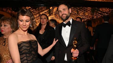 Sara Dosa (R) and Shane Boris (L), winner of the Best Documentary Featrue Film award for Navalny, attend the 95th Annual Academy Awards Governors Ball in Hollywood, California on March 12, 2023. (AFP)