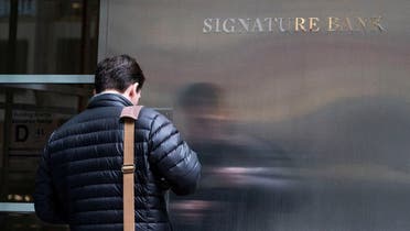 A worker arrives to the Signature Bank headquarters in New York City, U.S., March 12, 2023. REUTERS/Eduardo Munoz