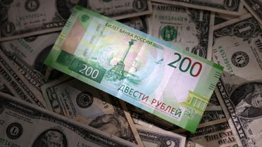 Russian Rouble and U.S. dollar banknotes are seen in this illustration taken March 10, 2023. (Reuters)