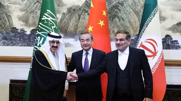 Wang Yi, a member of the Political Bureau of the Communist Party of China (CPC) Central Committee and director of the Office of the Central Foreign Affairs Commission, Ali Shamkhani, the secretary of Iran’s Supreme National Security Council, and Minister of State and national security adviser of Saudi Arabia Musaad bin Mohammed Al Aiban pose for pictures during a meeting in Beijing, China March 10, 2023. (Reuters)