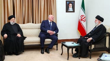 A handout picture provided by the office of Iran’s Supreme Leader Ali Khamenei shows him (R) meeting with Belarus President Alexander Lukashenko (C) in the presence of President Ebrahim Raisi (L) in Tehran on March 13, 2023. (AFP)