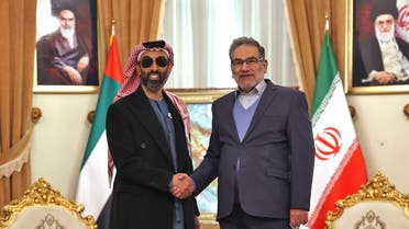Ali Shamkhani (R), Iran’s Secretary of the Supreme National Security Council, welcomes Sheikh Tahnoun bin Zayed al-Nahyan (L), the UAE’s National Security Adviser, in Tehran on December 6, 2021. (AFP)
