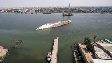 An aerial view of the 'Al-Mansur' yacht, once belonging to former Iraqi President Saddam Hussein, which has been lying on the water bed for years in the Shatt al-Arab waterway, in Basra, Iraq March 9, 2023. (Reuters)