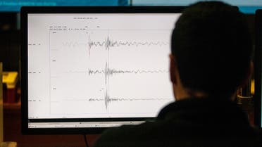 A technician of the National Seismological Center (CSN) of the University of Chile, organization in charge of monitoring the seismic activity in the Chilean territory, works in Santiago, August 4, 2017. (AFP)