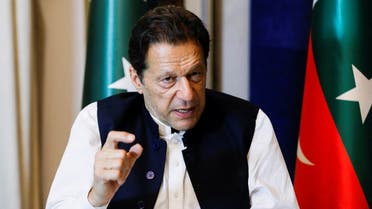 Former Pakistani Prime Minister Imran Khan gestures as he speaks with Reuters during an interview, in Lahore, Pakistan, on March 17, 2023. (Reuters)