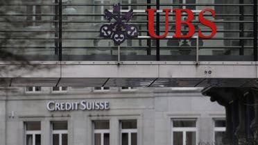 Logos of Swiss banks UBS and Credit Suisse are seen in Zurich, Switzerland March 19, 2023. (Reuters)