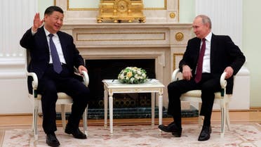 Chinese President Xi Jinping gestures while speaking to Russian President Vladimir Putin during their meeting at the Kremlin in Moscow, Russia, Monday, March 20, 2023. (AP)