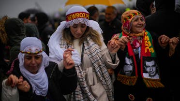 Kurdish women dance during the Newroz celebrations marking the start of spring in Istanbul, Turkey, Sunday, March 19, 2023. (AP)