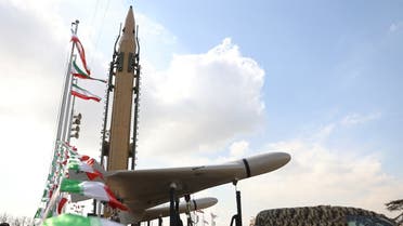 A drone is seen next to an Iranian missile during the 44th anniversary of the Islamic Revolution in Tehran, February 11, 2023. (Reuters)