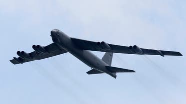 A Boeing B-52 Stratofortress strategic bomber from the US Air Force Andersen Air Force Base in Guam performs a fly-over at the Singapore Airshow in Singapore February 14, 2012. (Reuters)