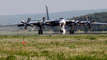 A Tupolev Tu-95MS strategic bomber, the carrier of nuclear rockets, lands at the Yemelyanovo airport near Russia's Siberian city of Krasnoyarsk, June 8, 2011. (Reuters)