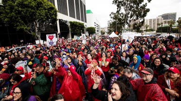 Los Angeles school workers protest in front of LAUSD headquarters during the first day of a walkout over contract negotiations that closes the country’s second largest school system in Los Angeles, California, US, March 21, 2023. (Reuters)