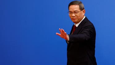 Chinese Premier Li Qiang gestures at a news conference following the closing session of the National People's Congress (NPC), at the Great Hall of the People, in Beijing, China, on March 13, 2023. (Reuters)