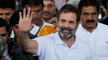 Rahul Gandhi, a senior leader of India's main opposition Congress party, waves towards his party supporters as he arrives at the New Delhi airport, after he appeared before a court in Surat in the western state of Gujarat, India, March 23, 2023. ( Reuters)