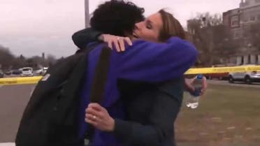 A Fox News reporter reunites with her son on live TV after a school shooting in Denver. (Screengrab)