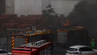 Thousands evacuated as fire hits warehouse in crowded Hong Kong district
