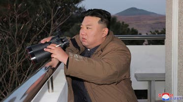 In this photo provided by the North Korean government, North Korean leader Kim Jong Un watches what it says is an intercontinental ballistic missile the country test-launched at the Sunan international airport in Pyongyang, North Korea, Thursday, March 16, 2023. (AP)
