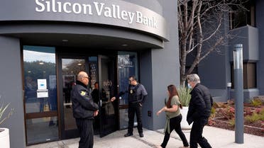 A customer is escorted into the Silicon Valley Bank headquarters in Santa Clara, California, US, on March 13, 2023. (Reuters)