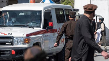 An ambulance carries victims from near the site of a suicide attack in Kabul on March 27, 2023. A suicide attack on March 27 not far from Afghanistan's foreign ministry killed six civilians and wounded several others, the interior ministry said. (AFP)