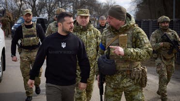 Ukraine's President Volodymyr Zelenskiy visits positions of Ukrainian Border Guards near the border with Russia, amid Russia's attack on Ukraine, in Sumy region, Ukraine March 28, 2023. Ukrainian Presidential Press Service/Handout via REUTERS ATTENTION EDITORS - THIS IMAGE HAS BEEN SUPPLIED BY A THIRD PARTY.