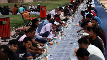 Muslims are seen during Iftar (breaking fast) in Riyadh, Saudi Arabia, March 27, 2023. REUTERS/Ahmed Yosri