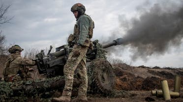 FILE PHOTO: Ukrainian service members fire a howitzer M119 at a front line, amid Russia's attack on Ukraine, near the city of Bakhmut, Ukraine March 10, 2023. REUTERS/Oleksandr Ratushniak/File Photo