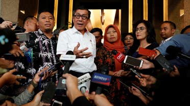 Indonesia's Law and Human Rights Minister Yasonna Laoly talks to journalists during a press conference with Baiq Nuril Maknun, a teacher on the island of Lombok who was jailed after she tried to report sexual harassment, in Jakarta, Indonesia, July 8, 2019. (Reuters)