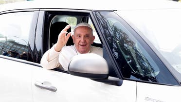  Pope Francis waves from a car as he leaves Rome’s Gemelli hospital in Rome, Italy, on April 1, 2023. (Reuters)