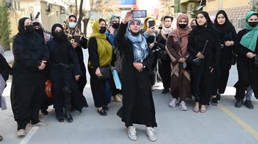 Afghan women stage a protest for their rights to mark International Women’s Day, in Kabul on March 8, 2023. (AFP)