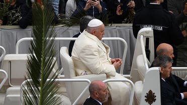Pope Francis arrives in the popemobile car for the Palm Sunday mass on April 2, 2023 at St. Peter's square in The Vatican. (Photo by Vincenzo PINTO / AFP)