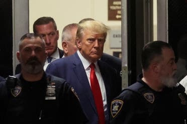 Former US President Donald Trump arrives at Manhattan Criminal Courthouse, after his indictment by a Manhattan grand jury following a probe into hush money paid to porn star Stormy Daniels, in New York City, US, April 4, 2023. (Reuters)
