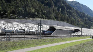 Cargo train drives into northern portal of Gotthard Base Tunnel near Erstfeld. (Reuters)