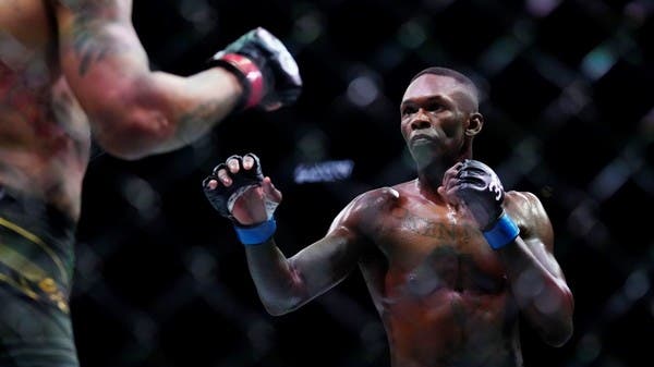 Israel Adesanya wins back middleweight crown at UFC 287