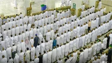 Crowds of worshipers perform Tarawih prayers on the night of the twenty-second of Ramadan