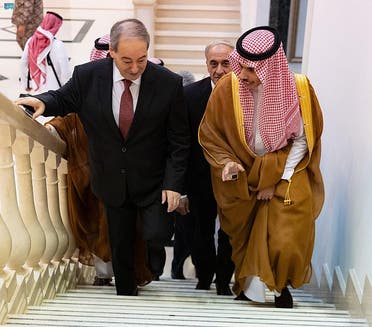 Saudi Foreign Minister Faisal bin Farhan and his Syrian counterpart, Faisal al-Miqdad