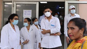 India records 10,158 new COVID-19 cases, omicron variant fueling spike