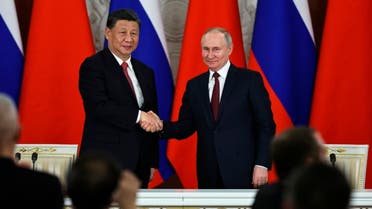 الرئيس الروسي ونظيره الصيني (أ ب)