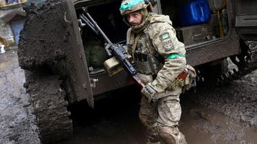 A Ukrainian serviceman returns from heavy fighting amid Russia?s attack on Ukraine, close to Bakhmut, Ukraine, April 15, 2023. REUTERS/Kai Pfaffenbach
