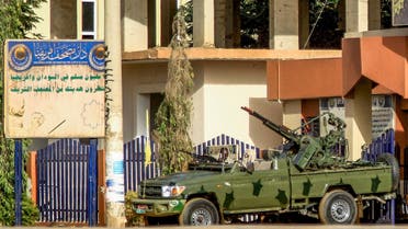 A technical vehicle (pickup truck mounted with turret) of Sudan's Rapid Support Forces (RSF) paramilitaries is stationed outside the offices of Dar al-Mushaf (African Holy Koran Publishing House), in the south of Sudan's capital Khartoum on April 17, 2023. (Photo by AFP)
