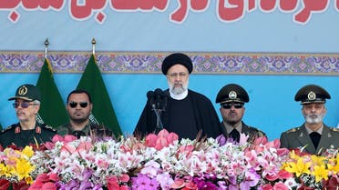 Iran’s President Ebrahim Raisi attends a military parade alongside high-ranking officials and commanders during a ceremony marking the country’s annual Army Day in Tehran on April 18, 2023. (AFP)