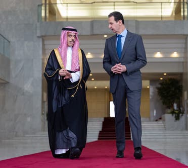 Saudi Arabia’s Foreign Minister Prince Faisal bin Farhan (L) with Syrian President Bashar al-Assad in Damascus on April 18, 2023. (Twitter/KSAMOFA)