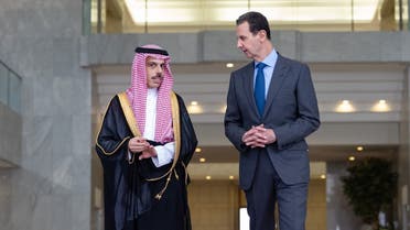 Saudi Arabia’s Foreign Minister Prince Faisal bin Farhan (L) with Syrian President Bashar al-Assad in Damascus on April 18, 2023. (Twitter/KSAMOFA)