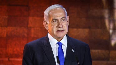 Israeli Prime Minister Benjamin Netanyahu speaks during a ceremony marking Yom HaShoah, Holocaust Remembrance Day for the six million Jews killed during World War II, at the Yad Vashem Holocaust Memorial in Jerusalem on April 17, 2023. (AFP)