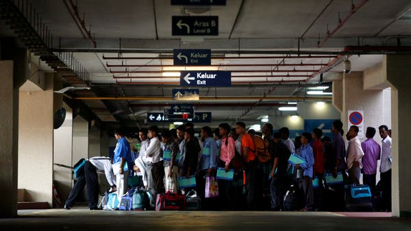 马来西亚调查没有护照的移民工人失业案件