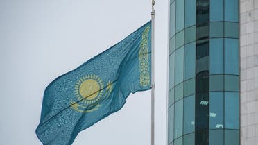 Kazakhstan’s national flag flies in front of a building of the Mazhilis, the lower house of Kazakhstan’s Parliament, in Astana, Kazakhstan, on January 13, 2023. (Reuters)