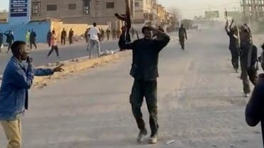 Sudanese army forces march down a street towards Khartoum, in Khartoum North, Sudan in this screengrab taken from a video released on April 21, 2023. (Reuters)