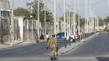 Somali security forces secure the street near the scene of a militant attack at a building in Abdias district of Mogadishu, Somalia February 21, 2023. REUTERS/Feisal Omar