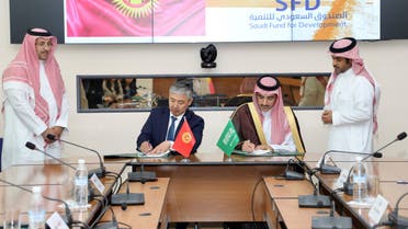 Kyrgyzstan finance minister Almaz Baketaev (left) and Saudi Fund for Development CEO Sultan al-Marshad (right) sign an agreement for $130 million worth of loans in the Kyrgyz capital Bishkek on Monday April 24, 2023. (Supplied)