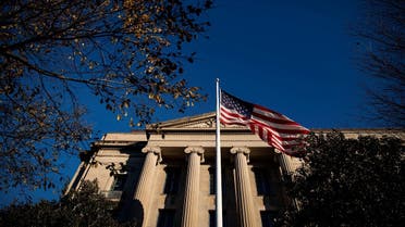 An American flag waves outside the Department of Justice building in Washington, DC. (File Photo: Reuters)