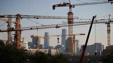 A view shows cranes in front of the skyline of the Central Business District (CBD) in Beijing, China. (Reuters)